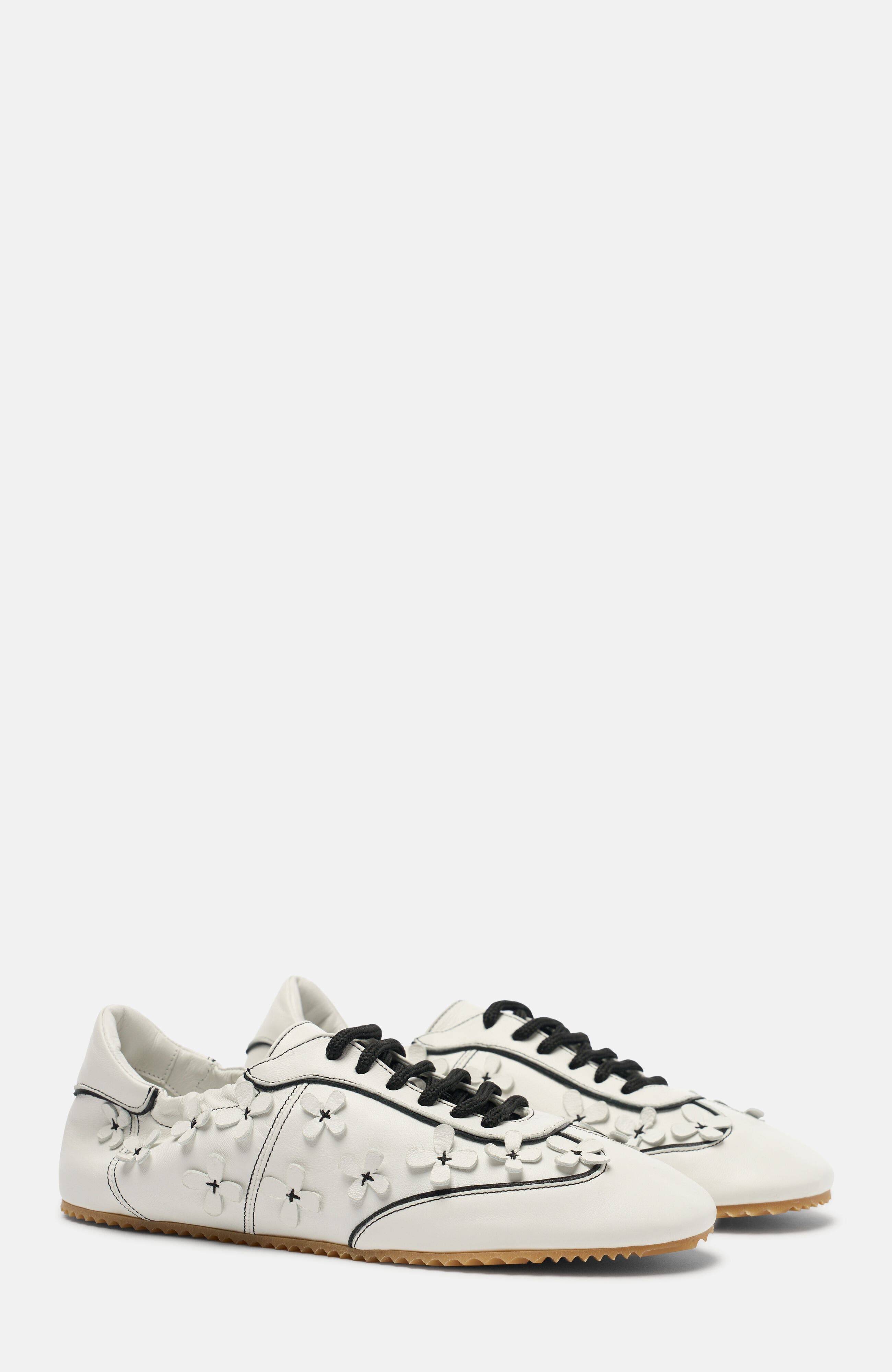Spring-Inspired Silhouette Sneakers - image 1
