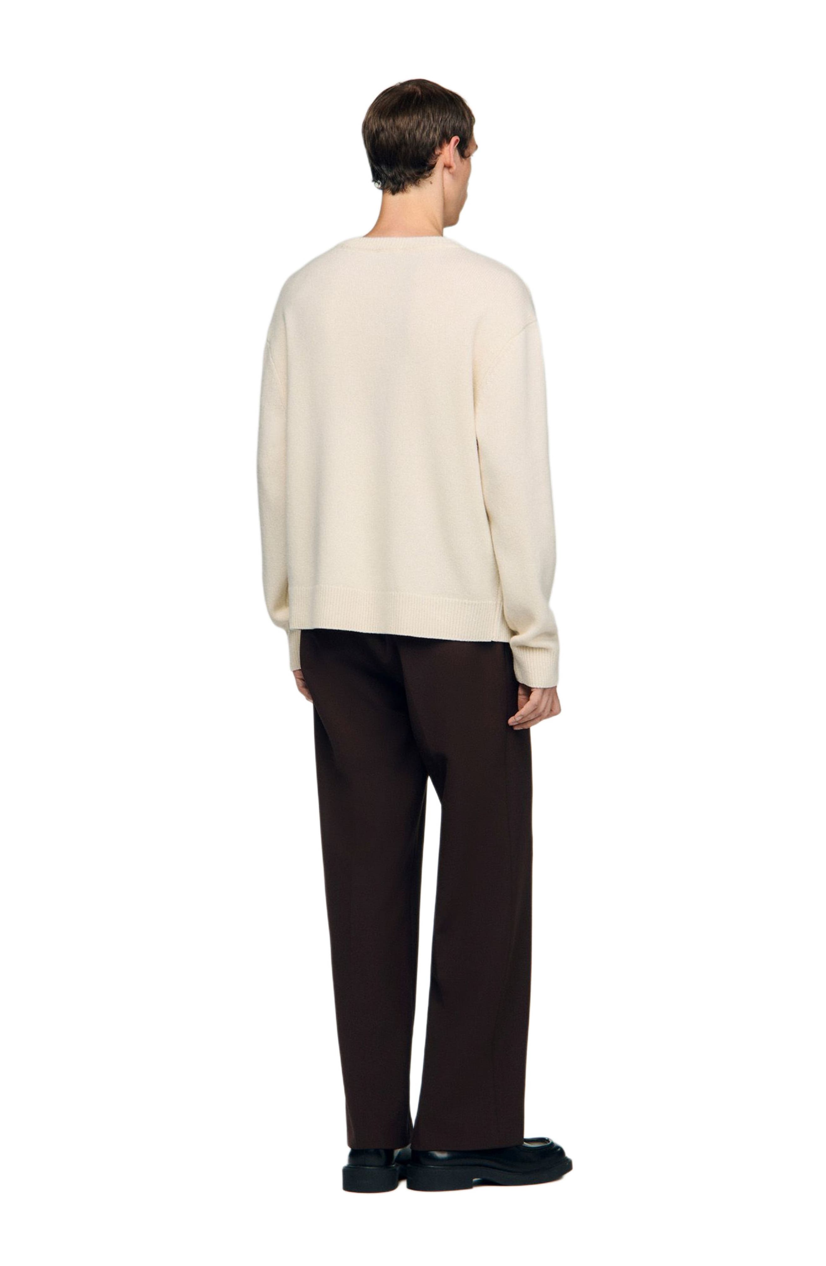 Wool sweater with flower detail - image 2
