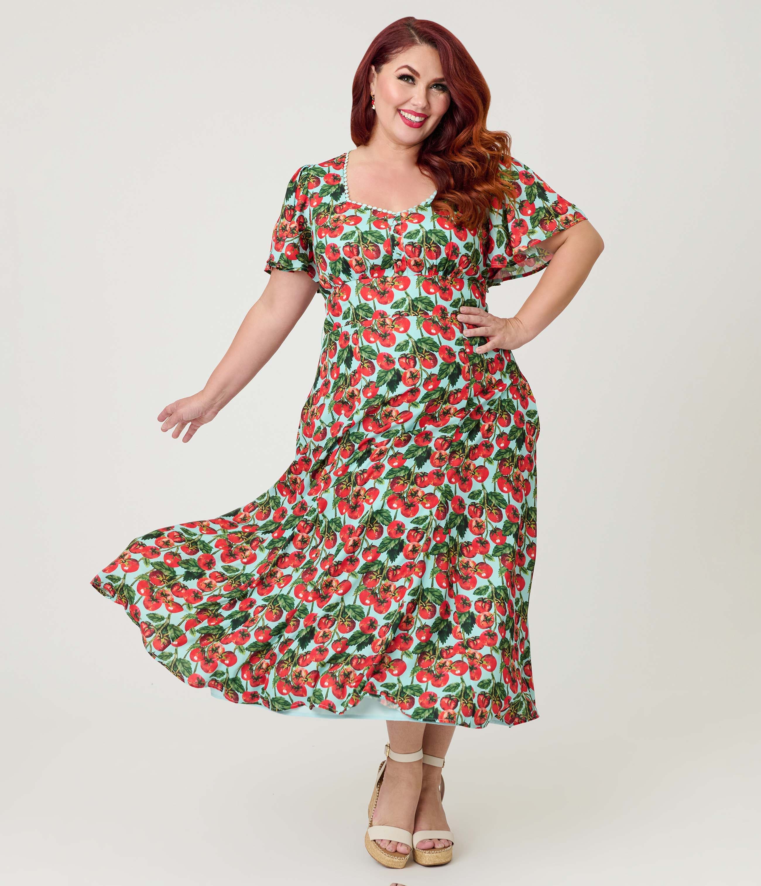 Plus Size Short Puff Sleeve Sweetheart Neck Godet Midi Dress - image 1